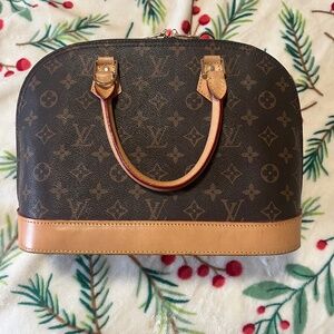 Never been used without tags, Louis Vuitton Alma